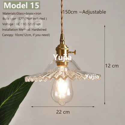 Model 15 pendant light with a clear faceted glass shade and polished copper brass-finished metal fixture
