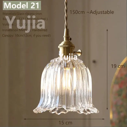 Vintage brass pendant light with clear fluted glass shade and polished copper hardware ideal for kitchen lighting