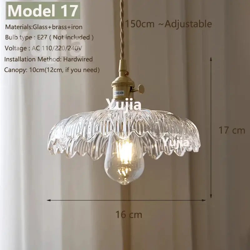 Vintage brass and clear glass pendant light with polished copper fixture and adjustable chain for kitchen use