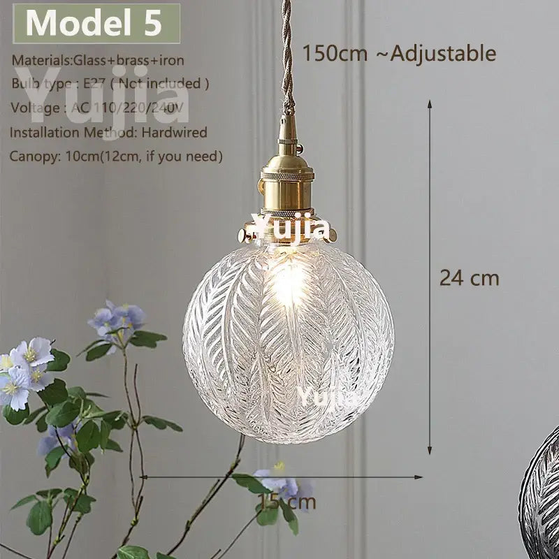 Vintage brass and clear glass pendant light with intricate leaf etching and brass iron hardware for kitchen use
