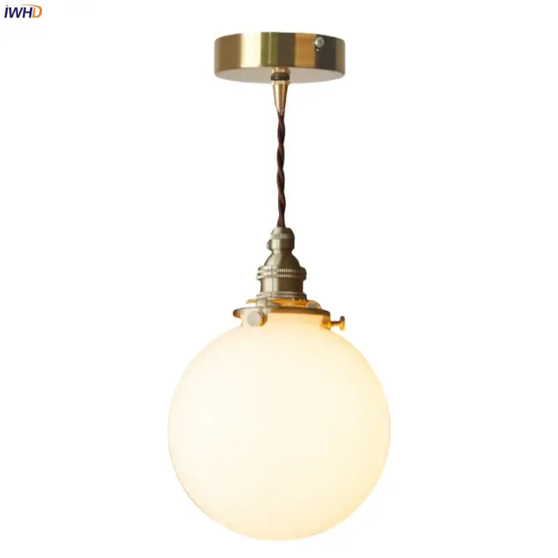 Vintage brass pendant light with cream glass ball and twisted brown cord ideal for kitchen decorbites cream glass decor