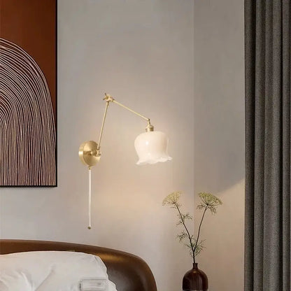 Vintage brass and cream resin led wall sconce with delicate off-white bell-shaped glass shade for bedroom decorbites cream resin