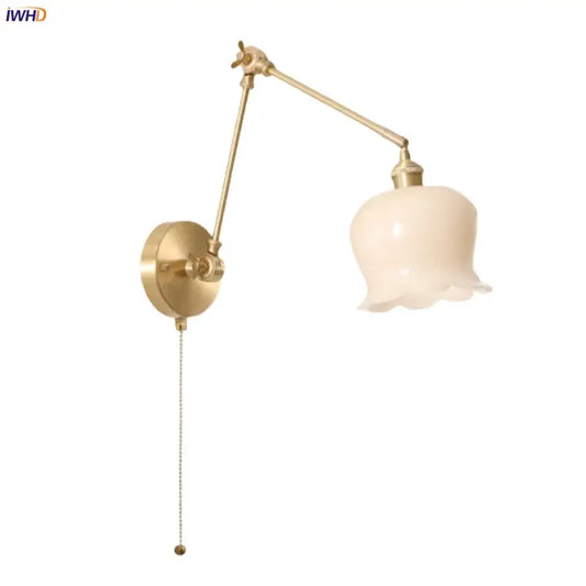Vintage brass and cream resin led wall sconce with gold-toned adjustable arm and cream resin led fluted glass shade for bedroom decorbites cream resin
