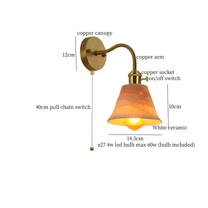 Copper-finished wall sconce with white ceramic lampshade and warm amber hues for decorbites ceramic led wall decor