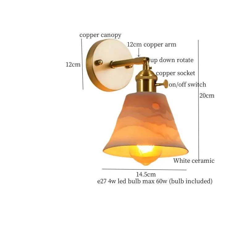 Copper-finished wall sconce with a white ceramic shade featuring warm orange yellow swirls for decorbites ceramic led wall decor