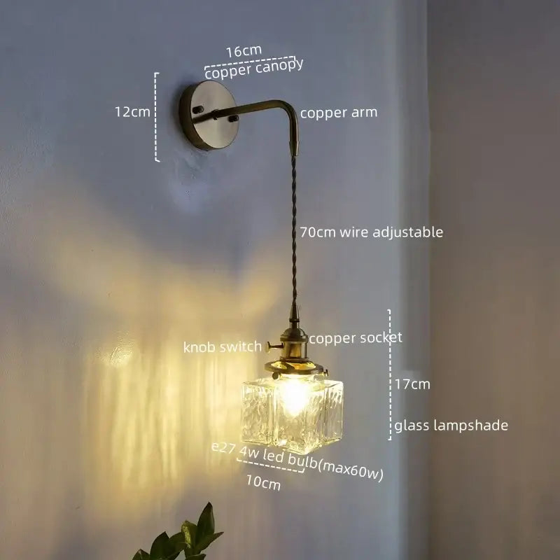 Vintage brass and copper led wall lamp with textured glass lampshade and adjustable wire arm for bedroom lighting