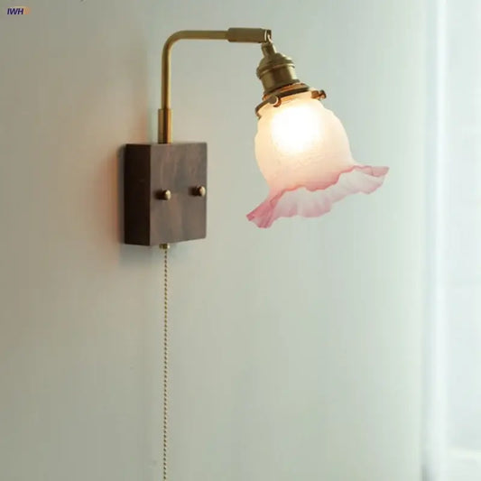 Vintage brass and glass pink led wall sconce with translucent ruffled shade for bedroom bedside lighting