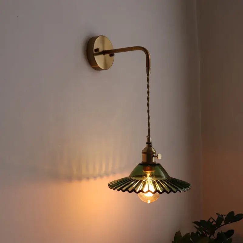 Vintage brass and green glass led wall lamp with a fluted shade and twisted cord for living room sconce lighting