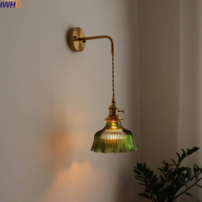 Vintage brass led wall lamp with green ribbed glass shade designed as a living room sconce wall lamp