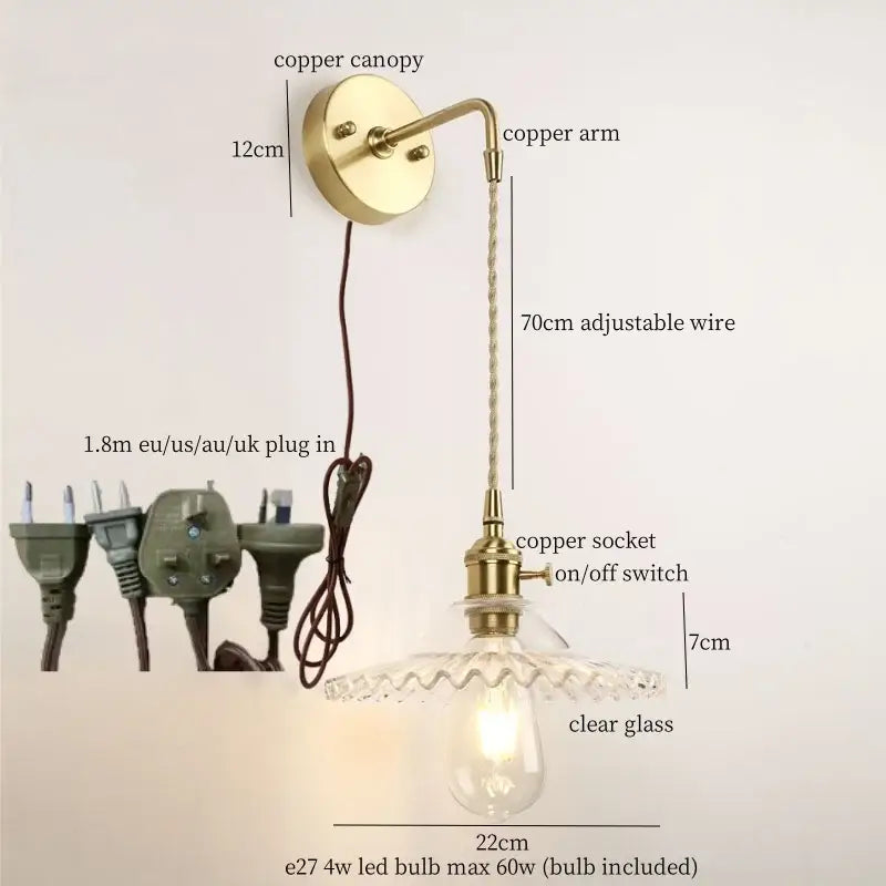 Vintage brass and green glass led wall light with antique brass-finished copper sconce and adjustable wire shade