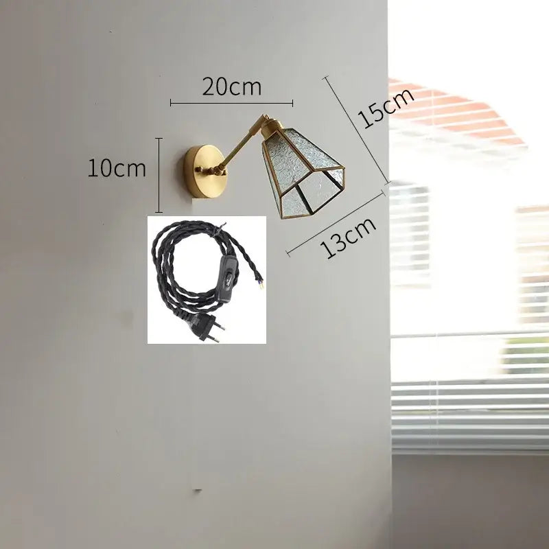 Brass-finished wall lights with green glass led faceted shade and articulated arm for vintage bedroom sconce lighting