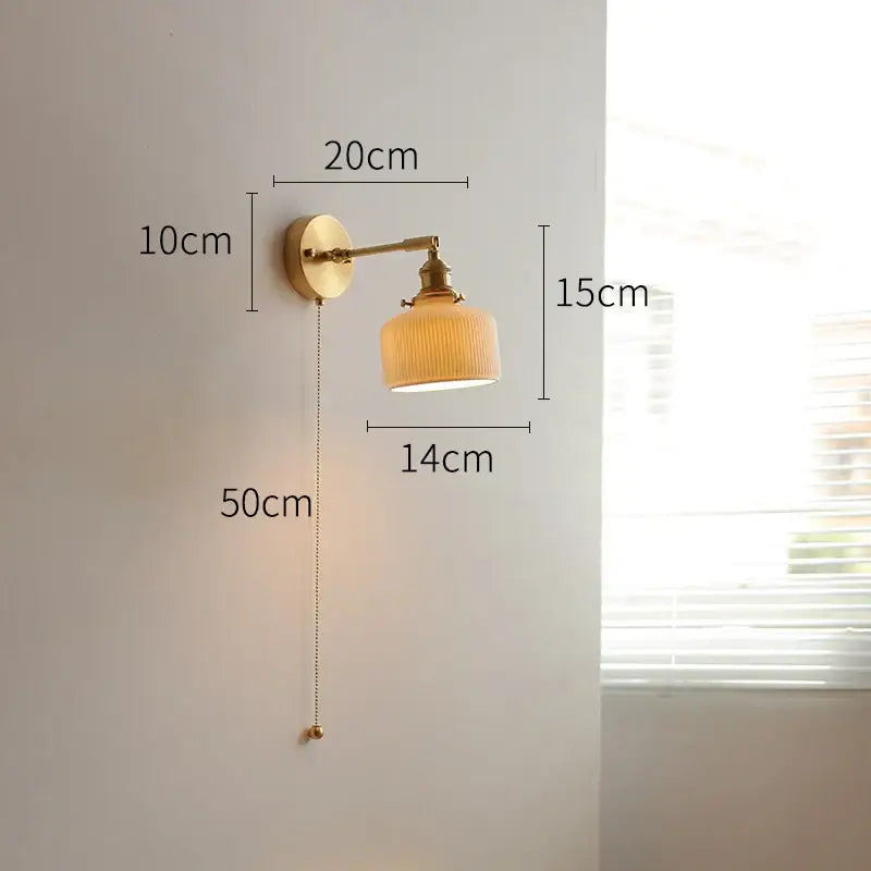 Vintage brass wall lights with ribbed warm-toned glass shade and adjustable arm for bedroom green glass led wall lighting