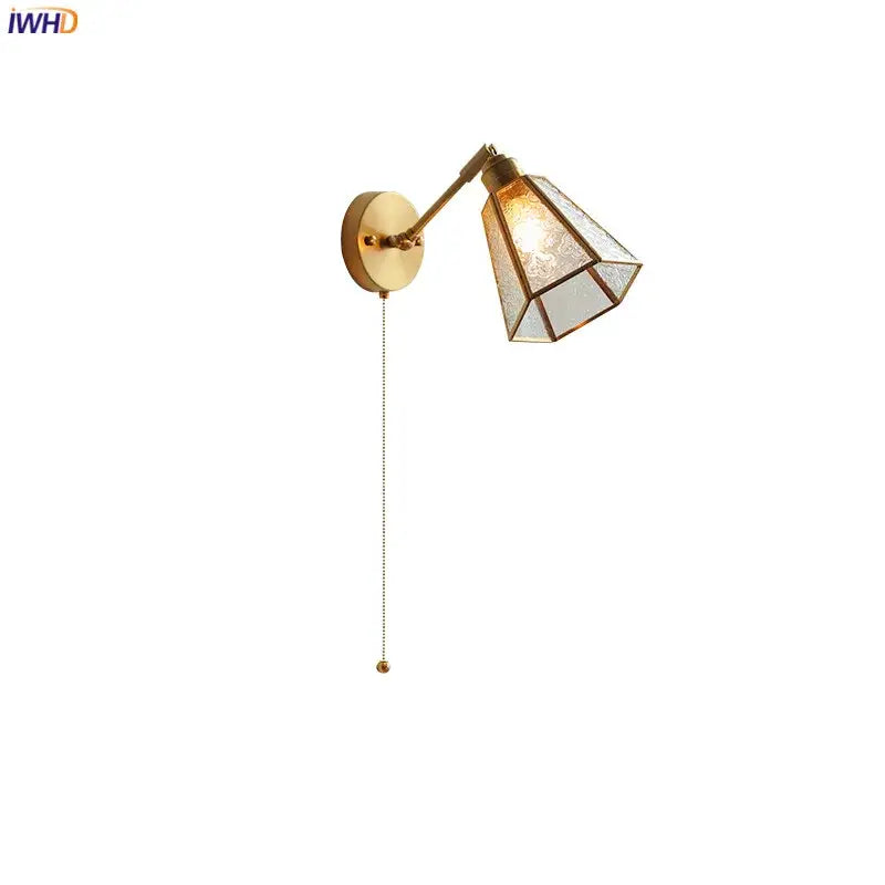 Gold-toned adjustable wall lights with faceted green glass led shade and pull chain for bedroom sconce lighting