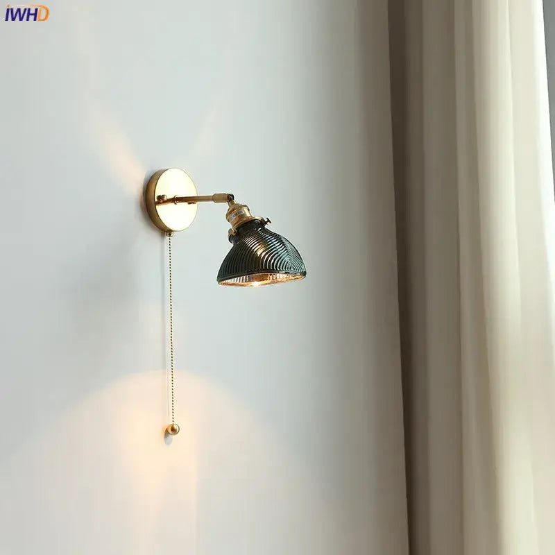 Vintage brass led wall lights with dark green ribbed glass shade and amber interior for bedroom sconce lighting