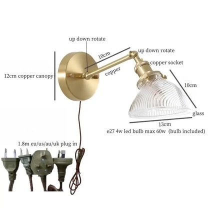 Vintage brass wall sconce with green glass led ribbed shade and adjustable arm for bedroom lighting