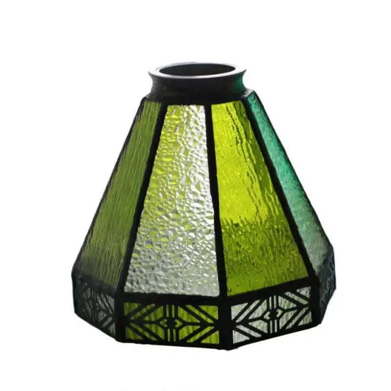 Vintage brass wall sconce with a conical green glass led shade featuring textured lime and white panels