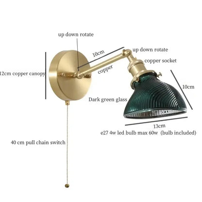 Vintage brass wall sconce with green glass led dark ribbed shade and articulated arm for bedroom lighting