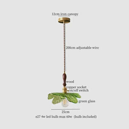 Vintage brass and green leaf led pendant lamp with a delicate glass leaf, wooden handle, and copper socket for dining room