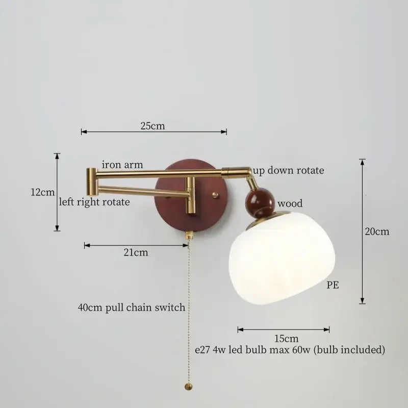 Brass-finished adjustable wall lamp with matte white glass globe, wooden accent, and iron arm for decorbites creamy iron led lighting