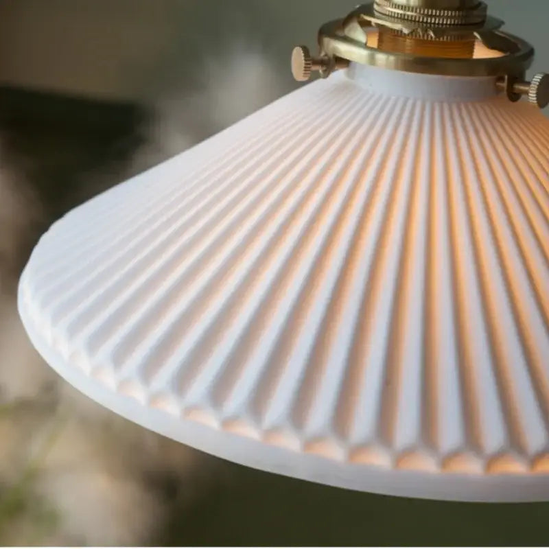 Vintage brass and off-white ceramic led pendant light featuring a white ribbed glass lampshade and brass fixture for dining room decorbites ceramic led pendant