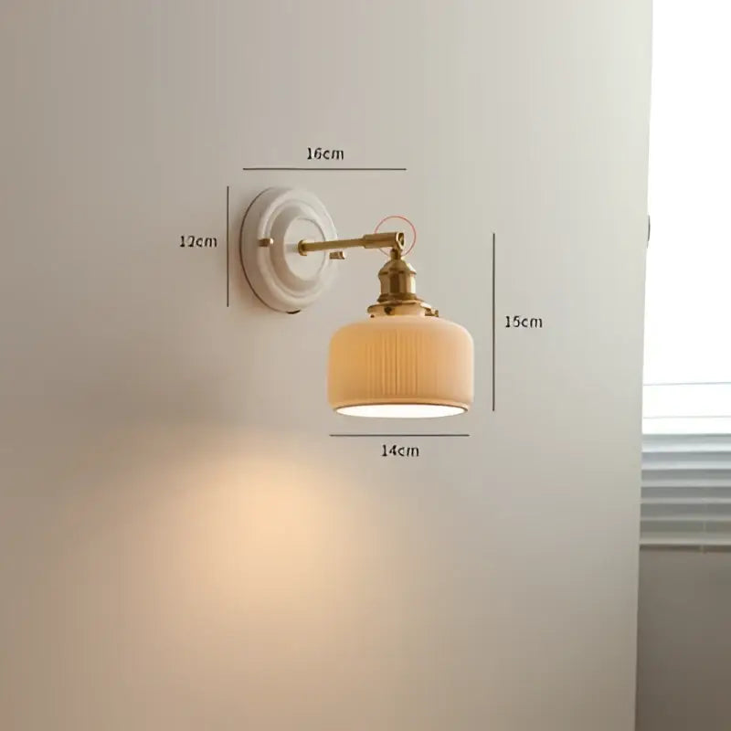 Cream-colored ribbed glass lampshade with brass-finished metal arm and plate vintage led wall light bedroom sconce