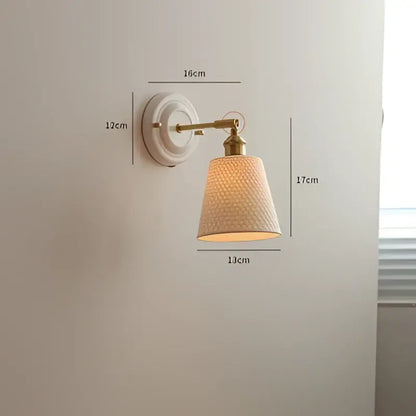 White textured ceramic wall light with brass-finished arm and lampshade vintage led wall light for bedroom use