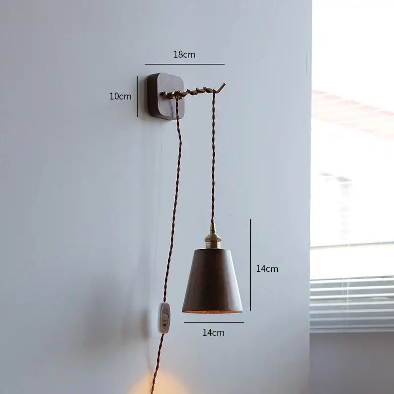 Vintage brass and ribbed glass led wall sconce with a rustic dark brown conical shade and twisted copper cord decorbites led wall