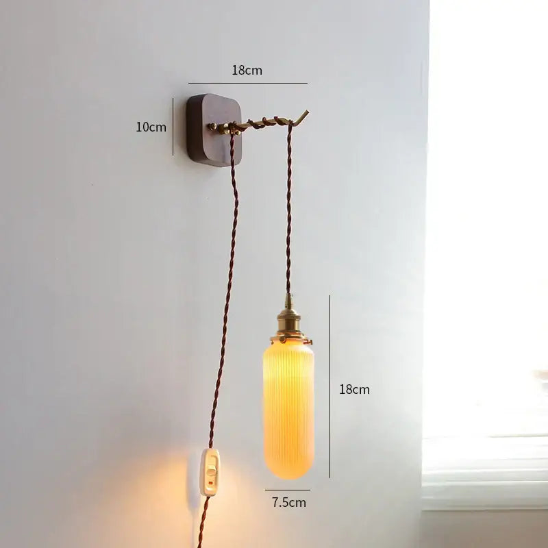 Vintage brass and ribbed glass led wall sconce with warm amber glass and twisted brown cord for bedroom decorbites led wall use