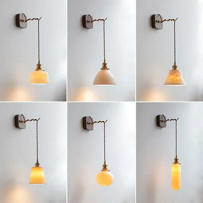 Warm-toned translucent glass led wall sconce with vintage brass accents and twisted cord suspension for bedroom decorbites led wall