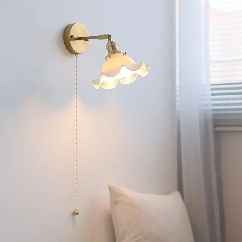 Gold-toned vintage brass ceramic led wall light with ruffled glass shade and pull-chain switch for bathroom mirror decorbites ceramic led