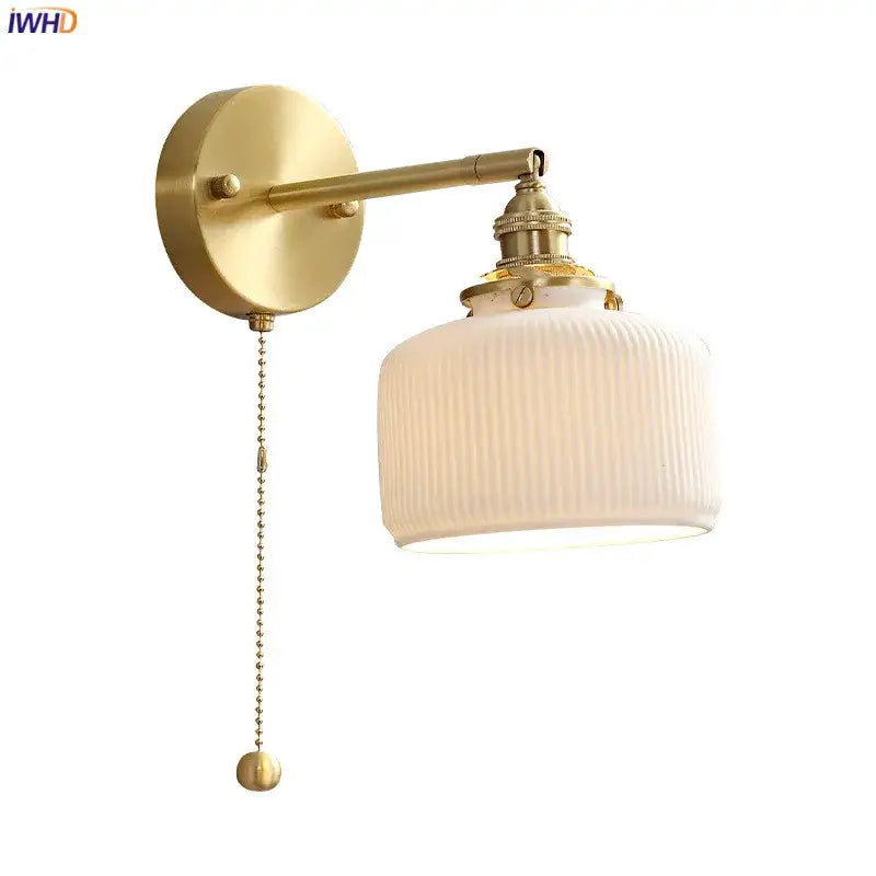 Vintage brass led wall lamp with gold finish ribbed off-white scalloped glass shade and pull-chain switch for bedroom
