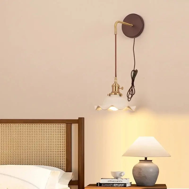 Vintage brass wall sconce with a curved arm and scalloped white glass shade for bedroom decorbites ceramic wood led lighting