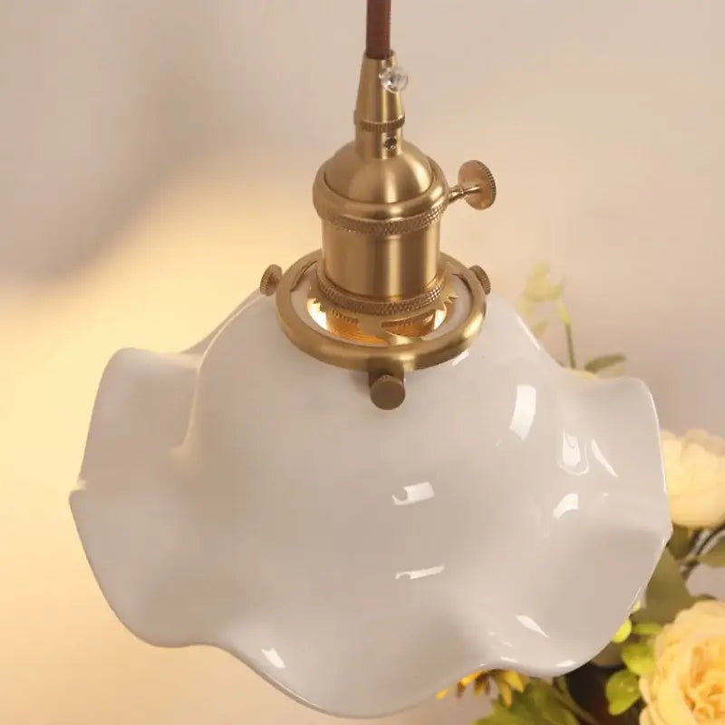 Vintage brass and scalloped glass wall sconce featuring a white ceramic lampshade with brass metal fixture decorbites ceramic wood led