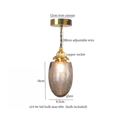 Vintage brass led pendant lamp with textured amber glass shade designed for dining room lighting