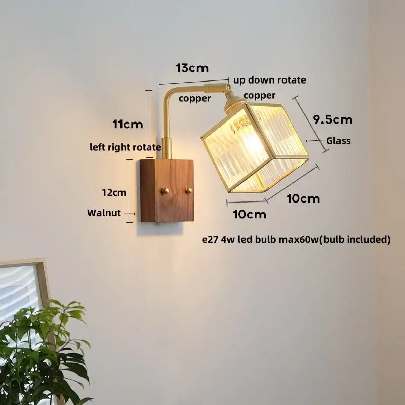 Vintage brass and walnut wall light with geometric glass shade and pull chain switch for bedroom lighting