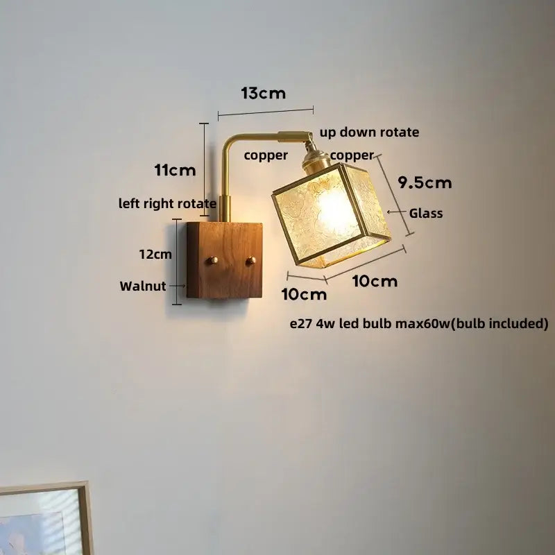 Copper and walnut wall light with pull chain switch featuring a square etched glass shade for bedroom use