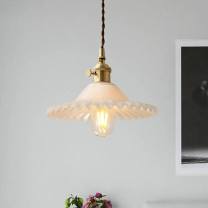 DecorBites™ Chloe scalloped pendant light with industrial brass fixture and white glass shade featuring edison bulb