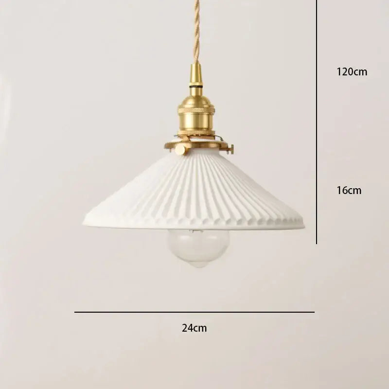 Vintage pendant light with white shade, ribbed ceramic, brass finish, and twisted cord for dining room lighting