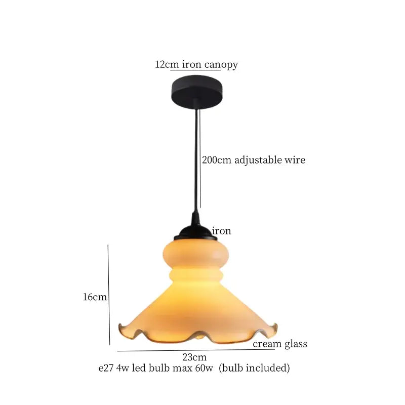 Cream-colored translucent glass led pendant light with fluted edge and black iron canopy vintage bedroom light