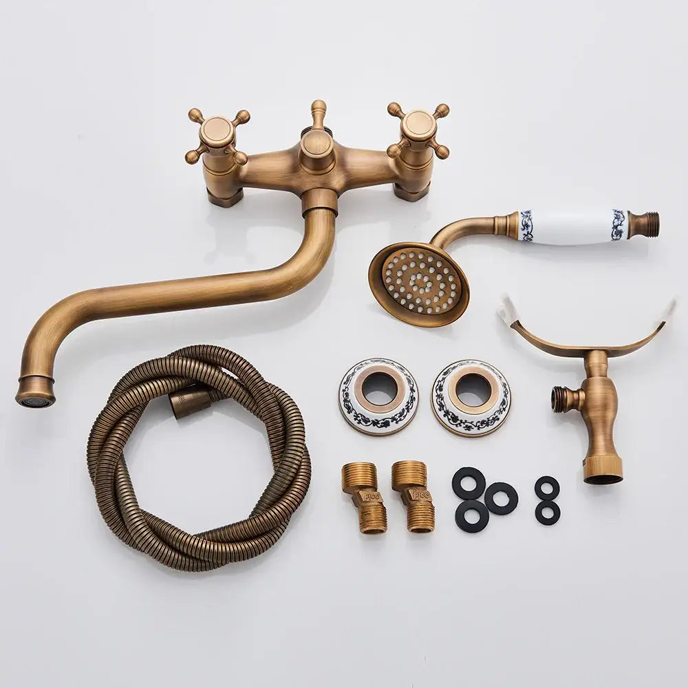 Vintage decorbites brass antique tub faucet set with curved spout cross-handle knobs and blue-white porcelain accents