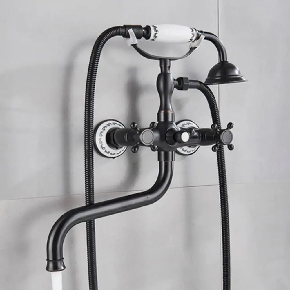 Black matte brass antique tub faucet with white ceramic handles and decorative accents from decorbites brass antique set