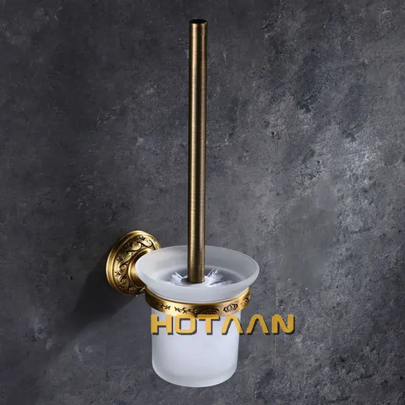 Vintage brass bathroom accessories set featuring a brass-finished toilet brush holder with frosted glass bowl and ornate wall mount for decorbites brass bathroom
