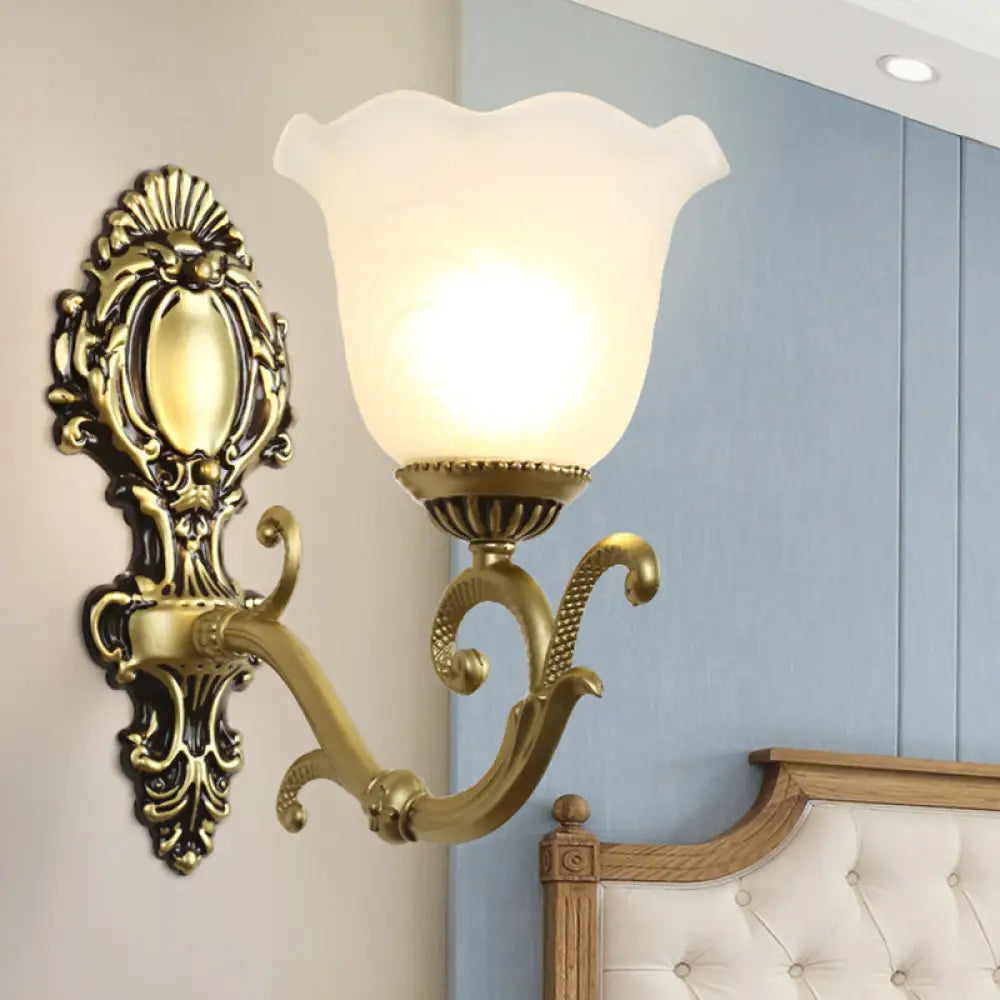 Vintage Brass/Beige Frosted Ribbed Glass Wall Sconce Lamp with Curvy Arm - 1 Light Bloom Sconce
