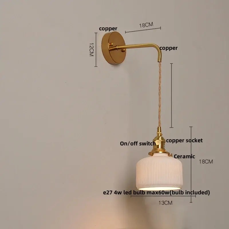 Vintage brass ceramic knob wall light featuring a copper sconce with a ribbed ceramic lampshade for bedroom use