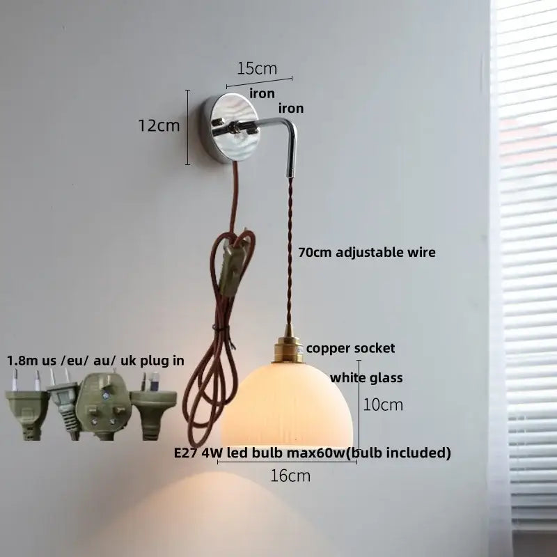 Minimalist wall lamp with polished iron bracket, adjustable copper wire, and frosted white glass globe for decorbites ceramic led wall