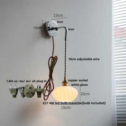 A warm vintage brass ceramic led wall lamp with a ribbed white glass shade for bedroom decorbites ceramic led wall use