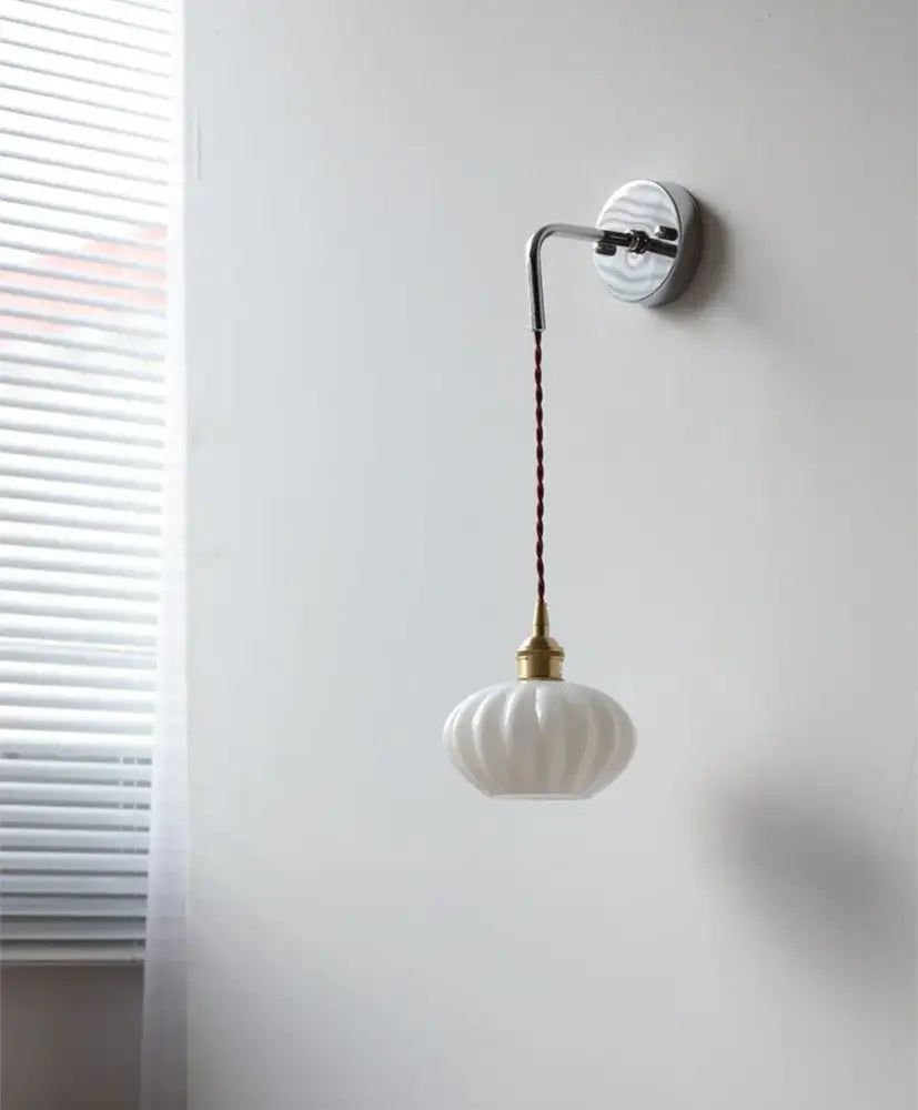 White ribbed glass ceramic led wall lamp with vintage brass fixture and braided brown cord for decorbites ceramic led wall use