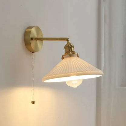 Vintage brass ceramic LED wall light with cream ribbed glass shade and exposed bulb for bedroom sconce decorbites ceramic led