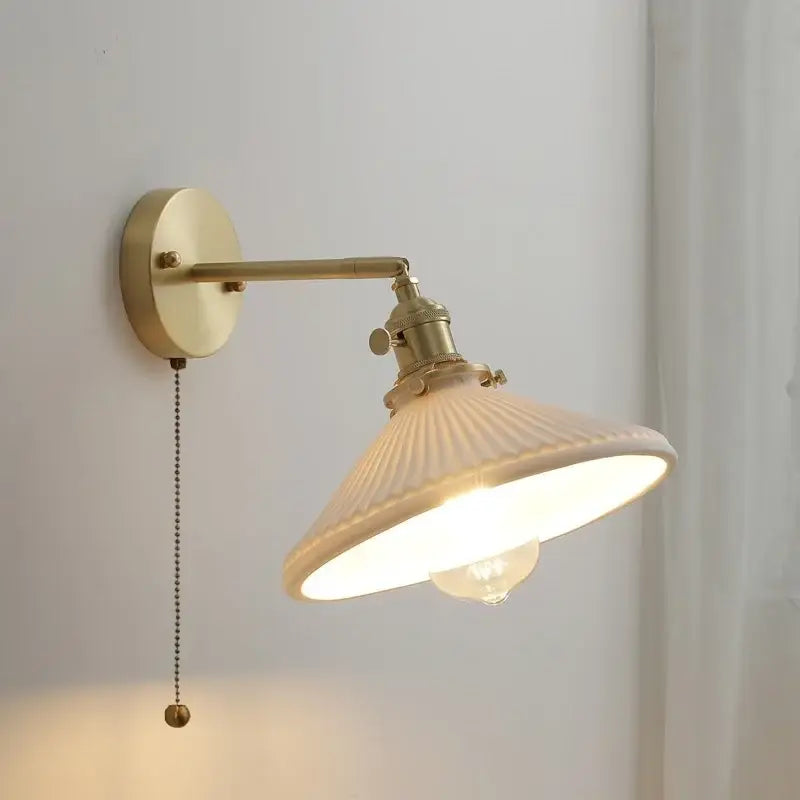 Vintage brass ceramic led wall light with ribbed off-white glass shade and exposed bulb for bedroom decorbites ceramic led wall