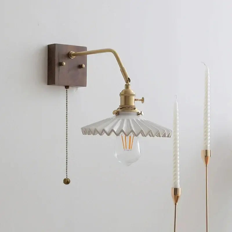 Vintage brass ceramic led wall sconce with scalloped white glass shade and exposed filament bulb for bedroom decorbites ceramic led wall